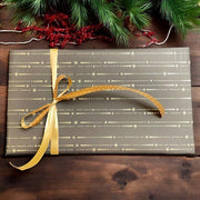 Jólapappír B 50 cm. Svartur við stjørnuskúmi. 100 mtr *