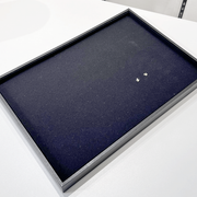 Smykkubakka til eyrastikk. Svört Flock