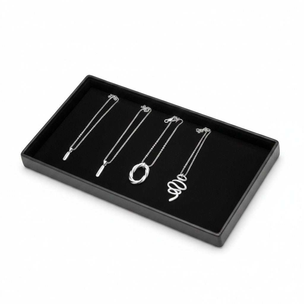 SuperSellerS black velvet jewelry display tray for necklaces, 42x22 cm, featuring four silver pendant necklaces.