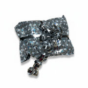 SuperSellerS silver holographic gift bag with a decorative metallic ribbon bow for elegant gift wrapping
